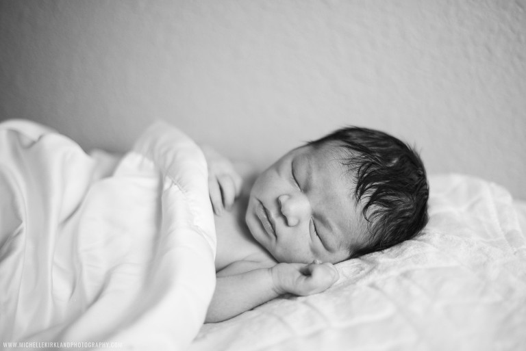 Artistic newborn photos by Dallas fine art photographer Michelle Kirkland.
